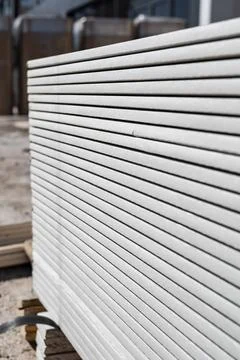 Close-up of a stack of new drywall. Stock Photos