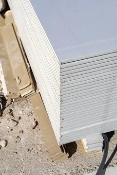 Close-up of a stack of new drywall. Stock Photos
