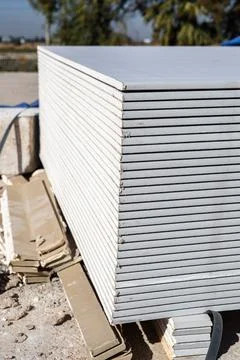 Close-up of a stack of new drywall. Stockfoto's