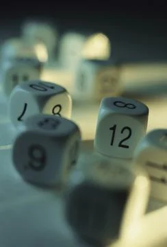 Close-up of a stack of numbered dice Stock Photos