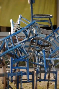 Close up on stack of old chairs Stock Photos