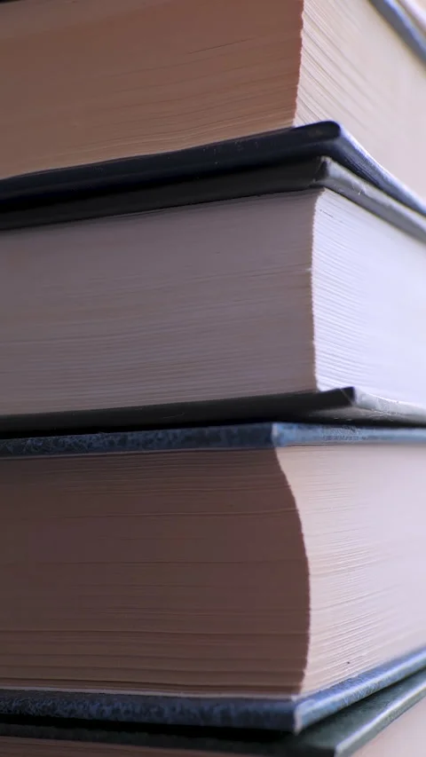Close-up of a Stack of Old Hardcover Books Stock Footage 263191309