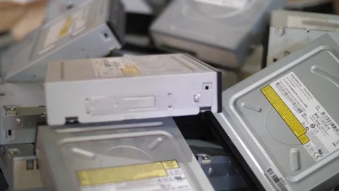 Close up of stack of optical disc drives sorted for recycling Stock Footage 105644691