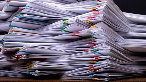 Close-up Stack overload document report paper-4K stop motion Stock Footage 119735736