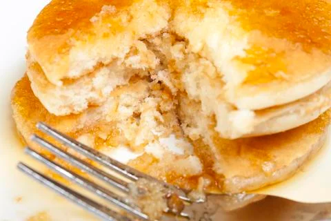 Close up of a stack of pancakes and maple syrup Stock Photos