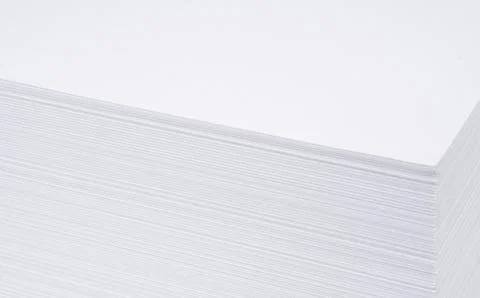 Close up of a stack of paper background. A4 blank paper stack texture. Mockup Stockfoto's