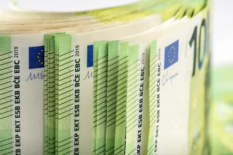Close-up of a stack of paper bills, side view. Euro banknotes stacked on top of Stock Photos