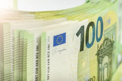 Close-up of a stack of paper bills, side view. Euro banknotes stacked on top of Stock Photos