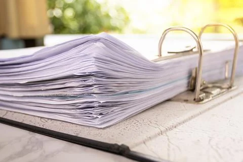 Close up - Stack paper file in the files folder of business Photos