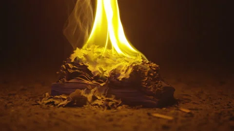 Close up of stack of papers burning in big flame inside of a fireplace Stock Footage 208762035