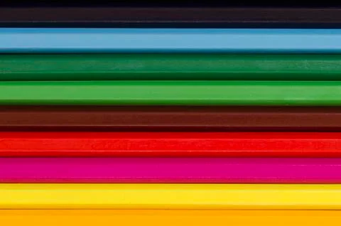 Close up of a stack of pencil crayons horizontal Stock Photos