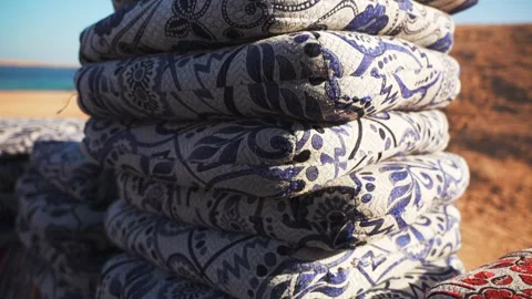 Close up stack of pillows in bedouin camp in the desert Stock Footage 253660438