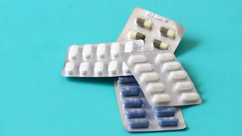 close up of stack of pills of blister pa... | Stock Video | Pond5