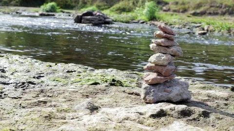 Close-up of stack of stones in perfect balance accomplish work is successful  Stock Footage 115995801