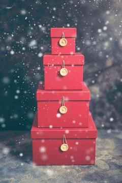Close up of a stack of storage boxes on dark background Stock Photos
