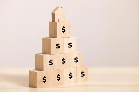 Close up stack Wooden home icon and  block to upside bar graph with dollar ic Stock Photos