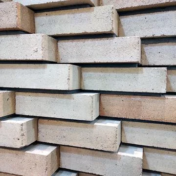 Close-up of stacked beige construction tiles Stock Photos