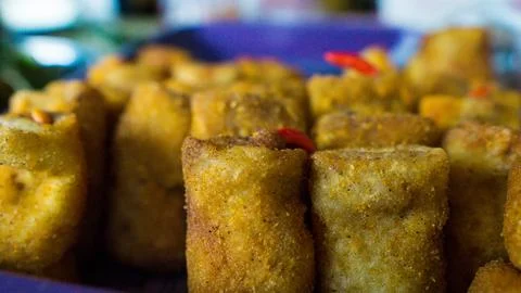 Close Up of Stacked Fried Spring Rolls Stock Photos