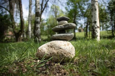 Close-up of stacked pebbles in forest Stock Photos