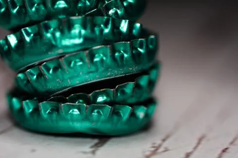 Close?up of stacked turquoise bottle caps, symbolizing recycling, design an.. Stock Photos