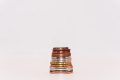 Close up of stacking coins on white background, USA one cent, Money growing Stock Photos