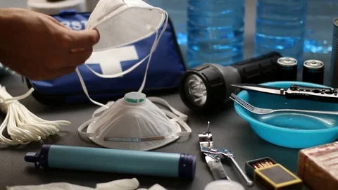 Close up of stacking masks with other disaster survival items. HD Stock-Footage 128605341