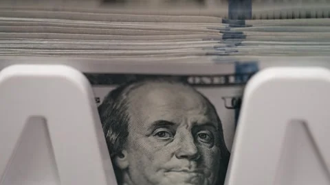 Close-up of stacks of U.S. currency with visible details of hundred-dollar bills Stock Footage 333979068