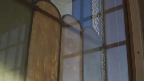 Close up of a stained glass window in an old abandoned church Stock Footage 292468004