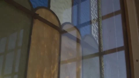 Close up of a stained glass window in an old abandoned church Stock Footage 292468011