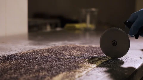 Close up Stainless Steel Round Roller Cuts dough Stock-Footage 106484009