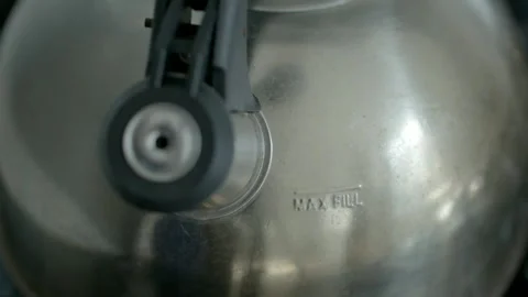 Close-Up of Stainless Steel Tea Kettle Surface Stock Footage 343089977