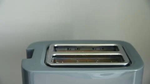 Close up stainless steel two slice toaster front view minimal kitchen backg.. Stock Footage 334570628