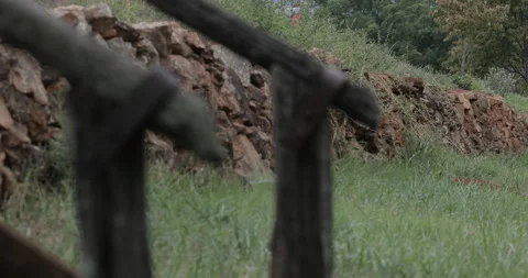 Close up of staircase before grassy hill Stock Footage 142836530