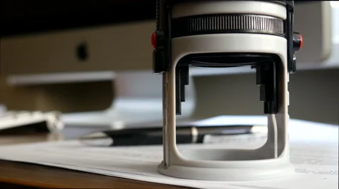 Close-up of stamping on the document Stock Footage