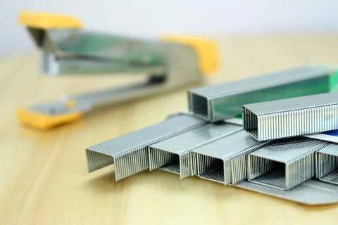 A close-up stapler with staples select focus Stock Photos