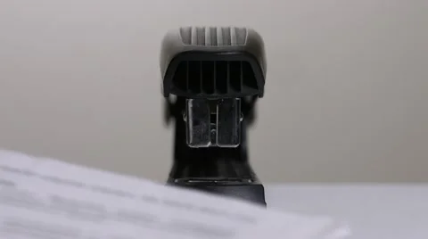 Close up of stapler, stapling sheets of paper  Video stock 64478015