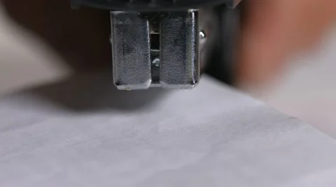 Close up of stapler, stapling sheets of paper 6 Stock-Footage 64478328