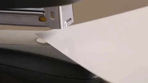 Close-up staples pliers paper Stock Footage 73069046