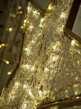 Close-up of a star made of small light bulbs. Christmas decorations and decor Stock Photos