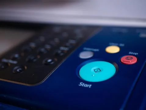 Close up start button on panel to using the Office professional multi-funct.. Stock Photos