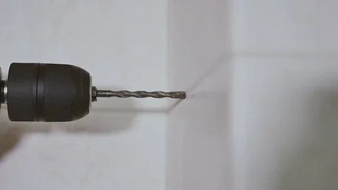 Close up of start drilling wall Stock Footage 69074887