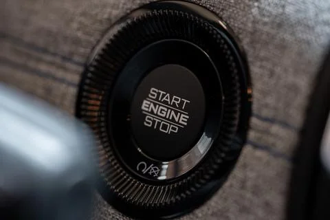 Close up of start engine stop button in car interior Foto stock