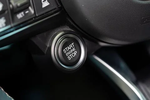 Close up of start engine stop button in car interior Stock Photos