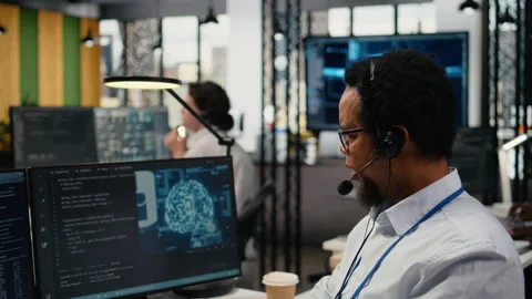 Close up of startup software developer doing tech support, helping users Stock Footage 322707939