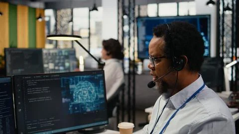 Close up of startup software developer doing tech support, helping users Stock Photos
