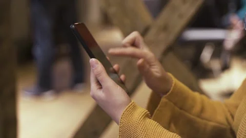 Close up static camera shot of female hands using a damaged phone Stock Footage 221860244