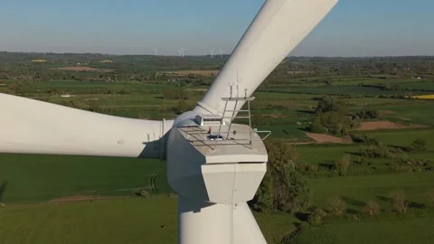 Close up static rear view of wind turbine rotating, renewable energy concept Stock-Footage 333936462
