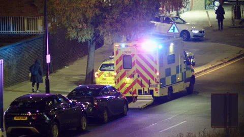 Close up static shot of an ambulance parked in North London, England Stock Footage 164937673