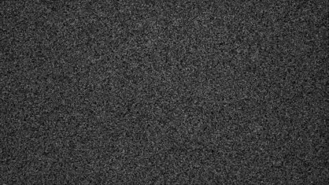Close-up of static TV screen with noise and flickering. Stock Footage 340501280