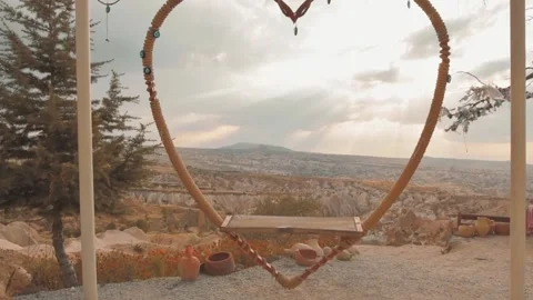 Close up static view heart beautiful swings swinging in slow motion with no p Stock Footage 165447163